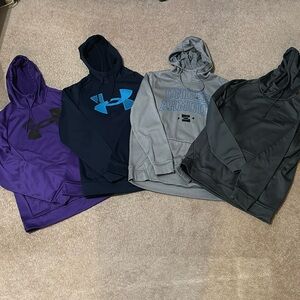 4 Under Armour Men’s Hoodies in size Medium.